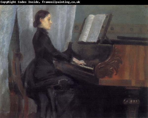 William Stott of Oldham CMS at the Piano